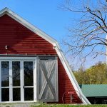 The barn at cricket creek farm with silo in background